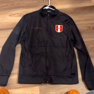 Selección de fútbol del Perú warm up top